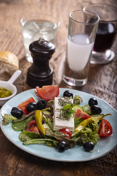 Greek salad on dark wood Greek salad on dark wood, by Zoonar Bernd Juergen