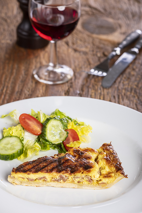 French quiche Lorraine with salad French quiche Lorraine with salad, by Zoonar Bernd Juergen