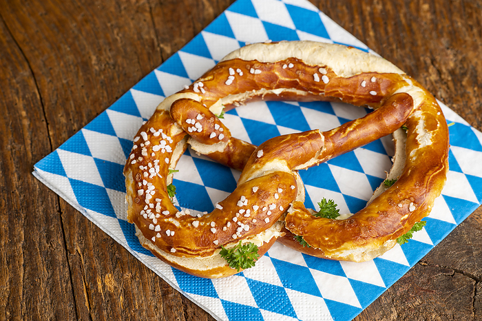 Bavarian pretzel on wood Bavarian pretzel on wood, by Zoonar Bernd Juergen