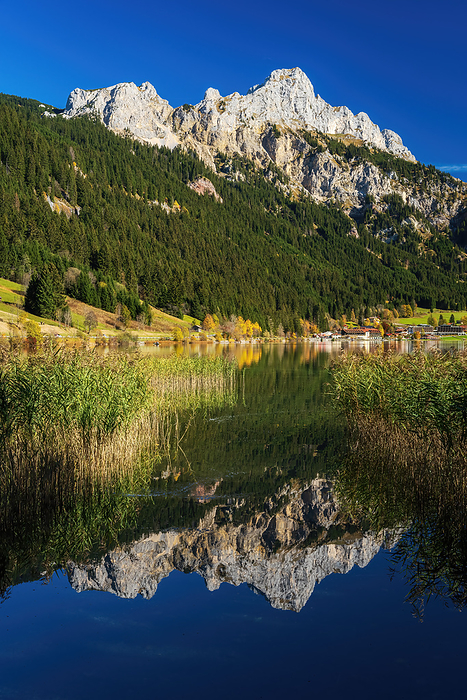 Lake Haldensee in the Tannheimer valley with mountain Rote Fl h in fall Lake Haldensee in the Tannheimer valley with mountain Rote Fl h in fall, by Zoonar Daniel Pahmei