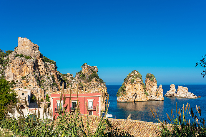 The spectacular sea stacks and the famous Tonnara of Scopello in Sicily The spectacular sea stacks and the famous Tonnara of Scopello in Sicily, by Zoonar Stefan Laws