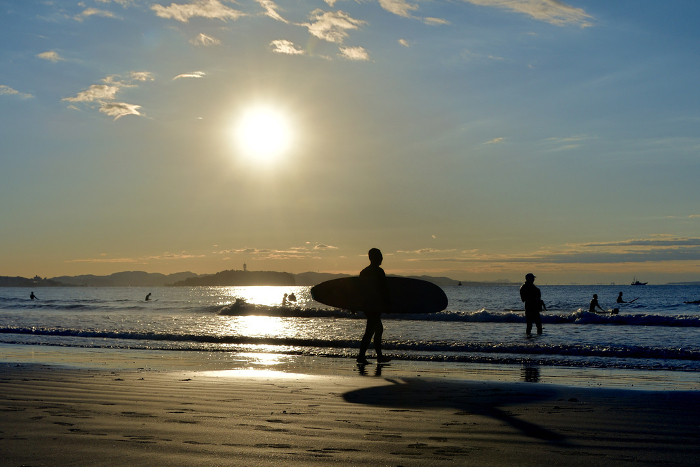 Sunrise and surfers (silhouette) in Shonan