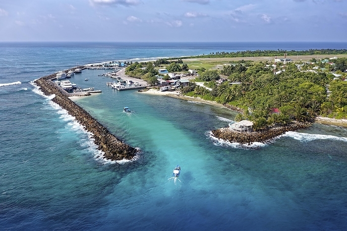Fishing port of Huvammula Island Maldives Harbor entrance, fishing harbor, well known diving site for tiger sharks, Fuvahmulah Island, Gnaviyani or Nyaviyani Atoll, Maldives, Asia 