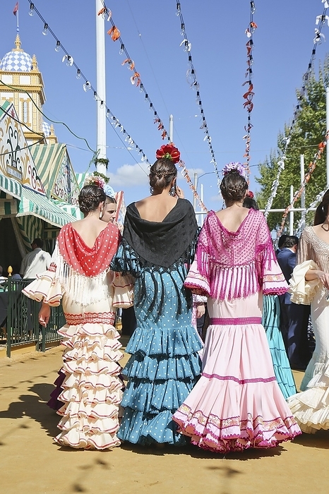 Feria de Abril, woman in flamenco dresses, traje de gitana, marquee, Seville, Andalusia, Spain, Europe, by Clara Montes