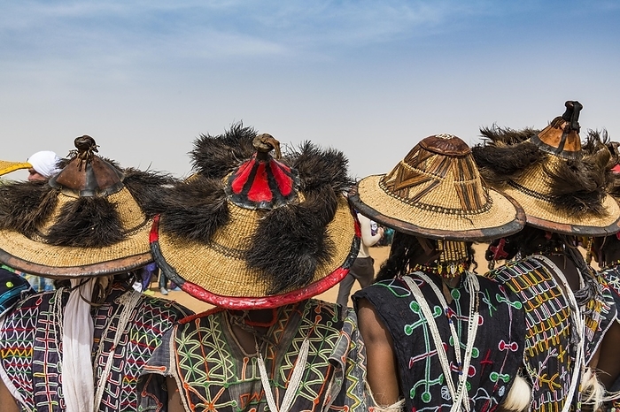 Traditional dressed Peul men, Gerewol festival, courtship ritual competition among the Woodaabe Fula people, Niger, Africa, by Michael Runkel