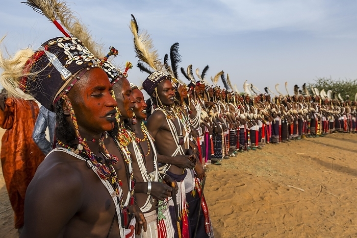 Wodaabe-Bororo men with faces painted at the annual Gerewol festival, courtship ritual competition among the Woodaabe Fula people, Niger, Africa, by Michael Runkel