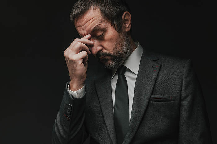 Professional man with migraine Professional man with a migraine., by IGOR STEVANOVIC   SCIENCE PHOTO LIBRARY