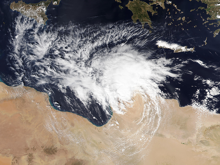 Storm Daniel hitting Libya, satellite image Satellite image of Storm Daniel hitting Libya on 10 September 2023. The storm originated from a low pressure system over the Ionian Sea on 4 September 2023 causing severe weather in Greece and Bulgaria. The storm then hit eastern Libya on 10 September 2023, causing catastrophic flooding, particularly in Derna where two collapsed dams led to over 6,000 fatalities and thousands reported missing as of 13 September 2023. Entire neighbourhoods were swept away from the flash flooding and four bridges were destroyed. Over 400 millimetres of rain fell in the region and floodwaters were reported to be as high as 3 metres. The storm then reached Egypt on 11 September 2023 causing moderate rainfall before dissipating. Image obtained by the Visible Infrared Imaging Radiometer Suite  VIIRS  on the NOAA 20 satellite., by NASA EOSDIS SCIENCE PHOTO LIBRARY