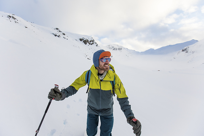Wide angle portrait of a backcountry skier, by Cavan Images / Christopher Kimmel / Alpine Edge Photography