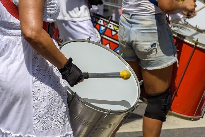 Drums and drummers playing samba during carnival celebrations in the streets of Brazil, Brasil, by Fred Pinheiro