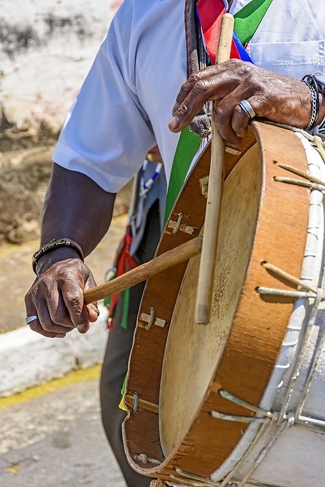 Ethnic drums used in religious festival in Lagoa Santa, Minas Gerais near the fire so that the leather stretch and adjust the sound of the instrument, Lagoa Santa, Minas Gerais, Brasil, by Fred Pinheiro