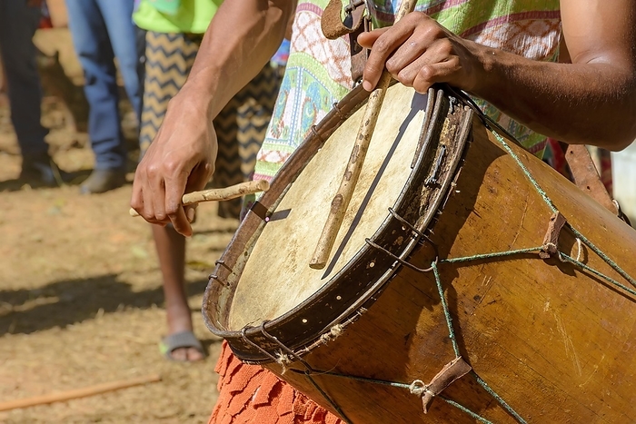 Ethnic and rustic handmade drums in a religious festival that originated in the mixing of the culture of enslaved Africans with European colonizers, Brasil, by Fred Pinheiro