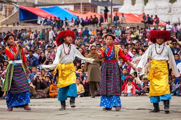 LEH, INDIA, SEPTEMBER 08, 2012: Young dancers in traditional Ladakhi Tibetan costumes perform folk dance at the Annual Festival of Ladakh Heritage in Leh, India. September 08, 2012, by Dmitry Rukhlenko