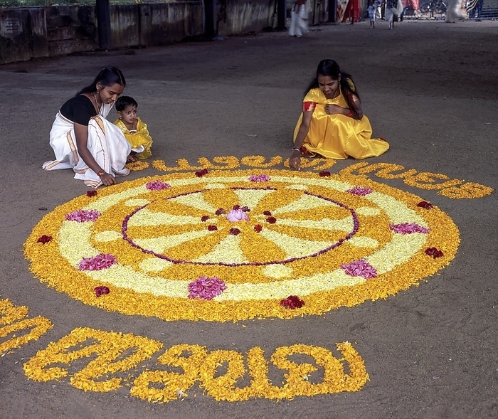 Aththapoovu or Floral decoration during Onam festival in front of Bhagavati temple in Kodungallur, Kerala, India, Asia, by Muthuraman V