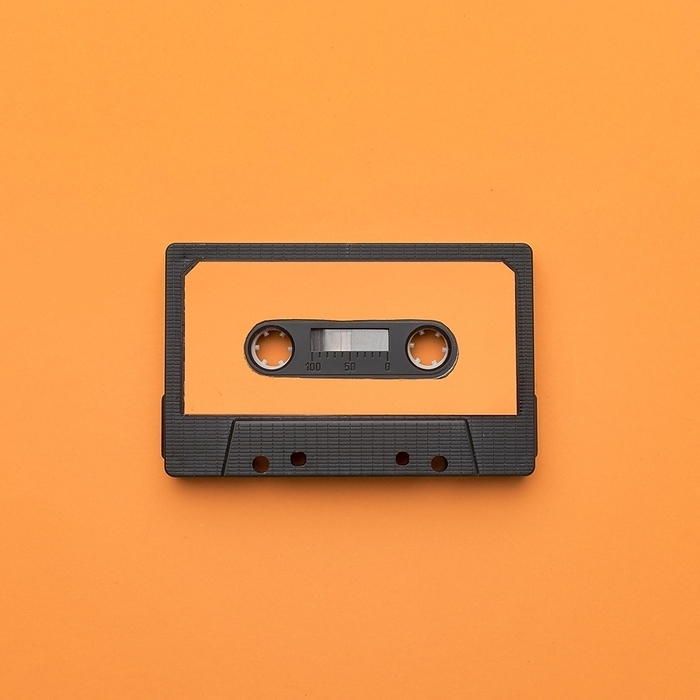 Vintage cassette tape orange background. Resolution and high quality beautiful photo, by Oleksandr Latkun
