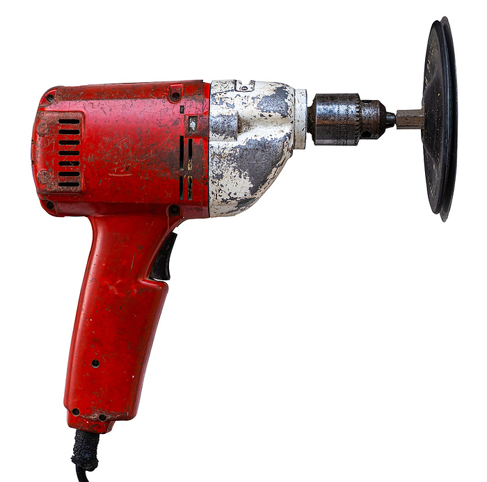 Isolated Vintage Electric Drill With Sanding Disk Isolated Vintage Electric Drill With Sanding Disk, by Zoonar Roy Henderson
