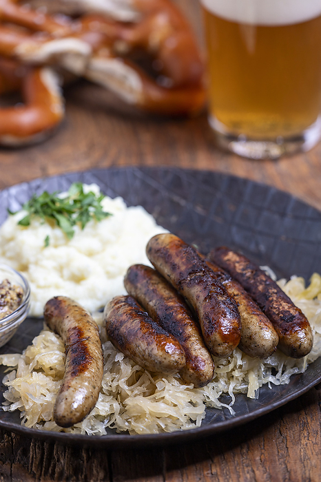 Franconian grilled sausages with sauerkraut Franconian grilled sausages with sauerkraut, by Zoonar Bernd Juergen