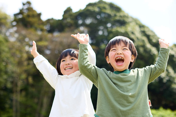 Japanese children waving