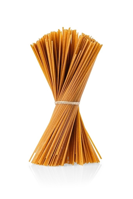 Bundle of bigoli, extruded pasta in the form of a long and thick strand isolated on white background