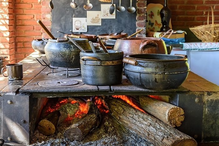 Traditional Brazilian food being prepared in clay pots and in the old and popular wood stove, Lagoa Santa, Minas Gerais, Brasil