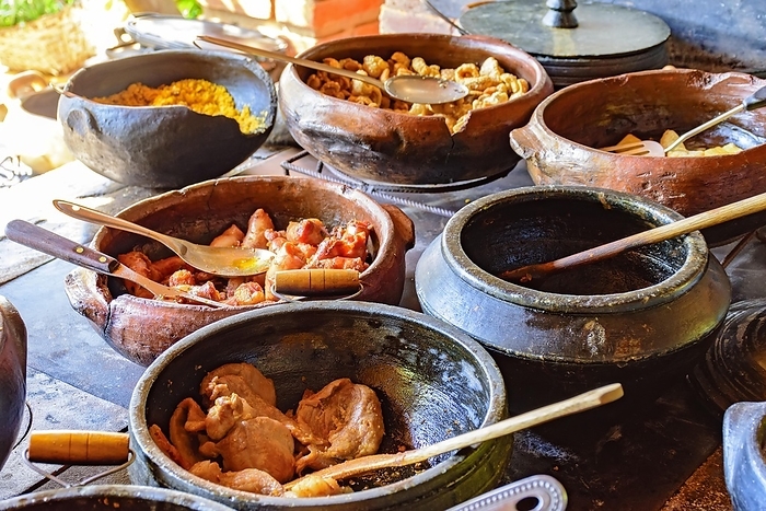 Traditional Brazilian food being prepared in clay pots and in the old and popular wood stove, Lagoa Santa, Minas Gerais, Brasil