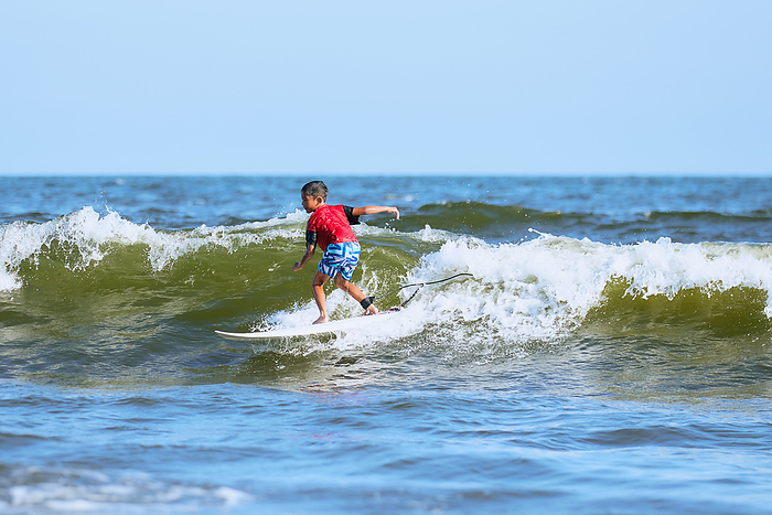 Japanese boy surfing