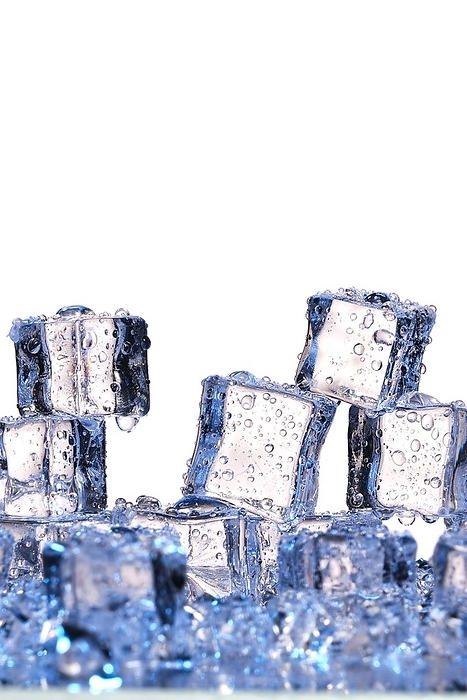 Transparent cold ice cubes on a white background