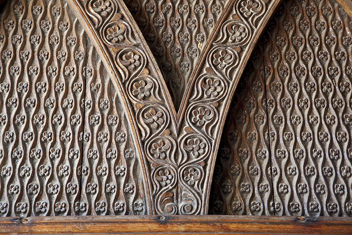 Detailed wood carving of flowers and patterns; Zanzibar, by Michael Melford / Design Pics