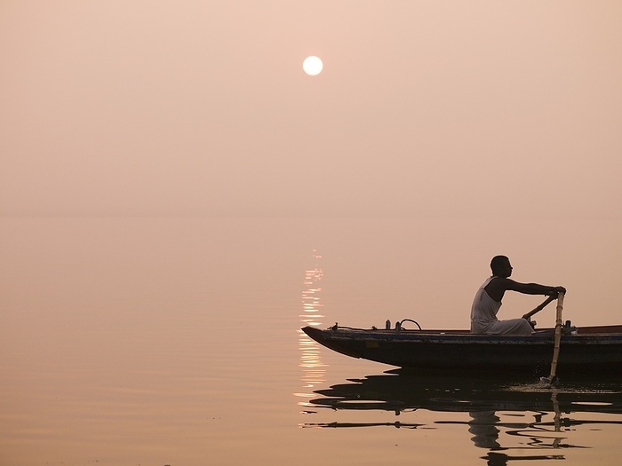 India Person Rowing Canoe On The River At Sunset  Ganges River,Varanasi,India, by Keith Levit   Design Pics