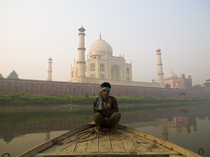 Taj Mahal, India Man Sitting On A Boat By The Taj Mahal  Taj Mahal,Agra,India, by Keith Levit   Design Pics