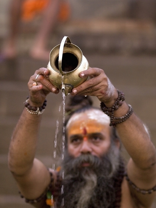 India A Sadhu Pouring Libations Into The Ganges  Ganges River,Varanasi,India, by Keith Levit   Design Pics