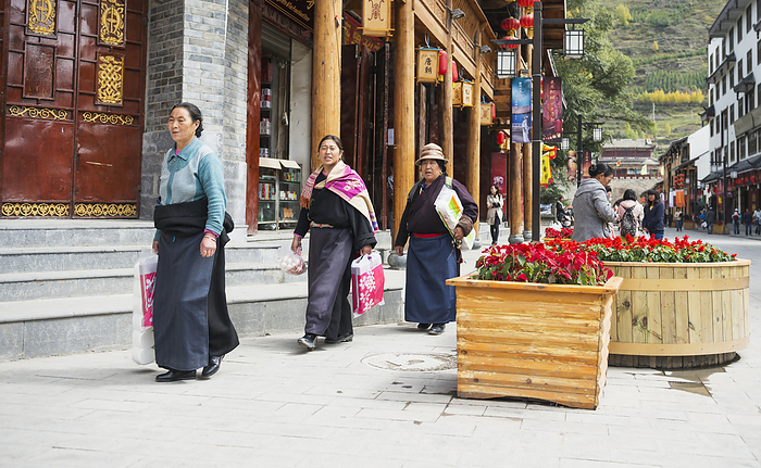 China Tibet Tibetan Women Walking With Shopping Bags  Songpan, Sichuan, China, by Sergey Orlov   Design Pics