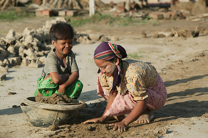 Myanmar Children Working To Make Bricks From Clay In Myanmar  Ayeyarwady, Burma, by Jim Holmes   Design Pics