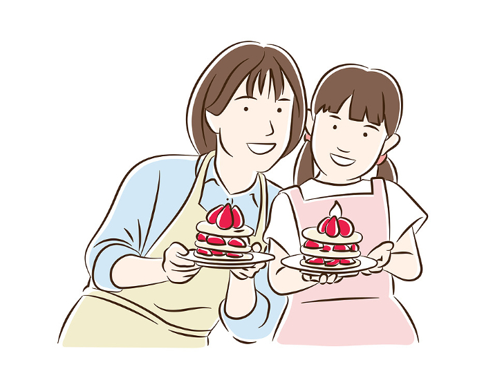 A girl and her mom making pancakes