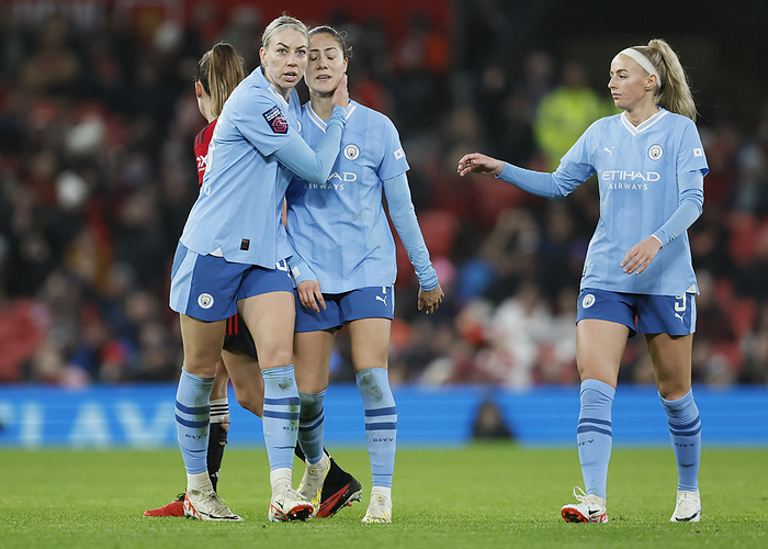 Manchester United v Manchester City   Barclays Women s Super League Alanna Kennedy of Manchester City consoles Laia Aleixandri of Manchester City after she is sent off during the Barclays Women s Super League match between Manchester United and Manchester City at Old Trafford on November 19, 2023 in Manchester, England.  This Photograph May Only Be Used For Newspaper And Or Magazine Editorial Purposes. May Not Be Used For Publications Involving 1 Player, 1 Club Or 1 Competition Without Written Authorisation From Football DataCo Ltd. For Any Queries, Please Contact Football DataCo Ltd on  44  0  207 864 9121