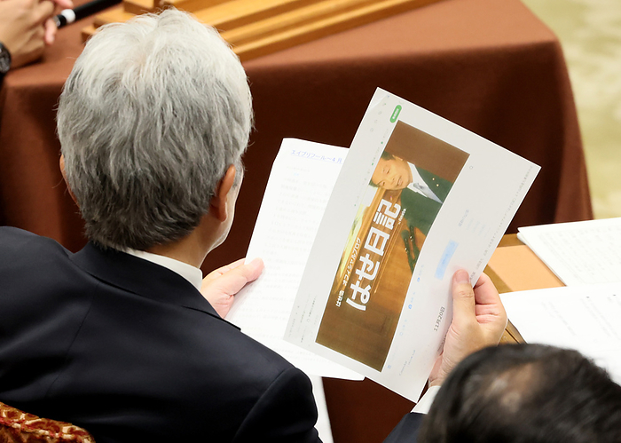 Japanese Prime Minister Fumio Kishida attends Lower House s budget committee session November 22 2023, Tokyo, Japan   A member of Lower House s budget committee reads a copy of the blog of Ishikawa Governor Hiroshi Hase at the budget committee session at the National Diet in Tokyo on Tuesday, November 22, 2023. Hase commented Japan gave gifts to the IOC members to promote the Tokyo 2020 Olympic Games last week.      photo by Yoshio Tsunoda AFLO 
