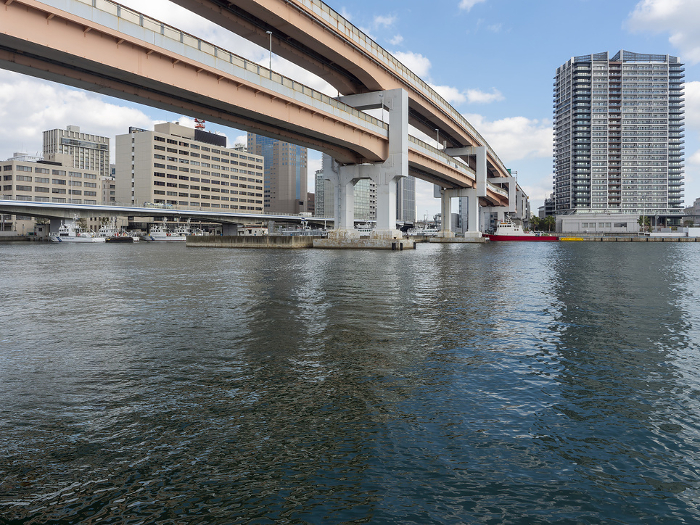 View of Kobe Port straddled by an elevated bridge