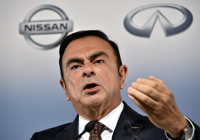 Nissan s net profit up 4 percent Announced forecast for fiscal year ending March 31, 2003 May 12, 2014, Yokohama, Japan   CEO Carlos Ghosn of Nissan Motor Co., gestures as he presents its quarterly earnings during a news conference at its head office in Yokohama, south of Tokyo, on Monday, May 12, 2014. Ghosn said its net profit rose 4.8  in the January to March quarter, thanks to the weak yen which offset sluggish sales in overseas markets. Ghosn forecast a net profit of  405 billion in the current business year with a global sales target of 5.65 million vehicles.   Photo by Natsuki Sakai AFLO  AYF  mis 