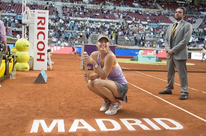 Madrid Open Women s Final Sharapova wins Maria Sharapova  RUS , MAY 11, 2014   Tennis : Maria Sharapova of Russia celebrates with the trophy after winning the women s singles final match of the ATP Tennis World Tour Mutua Madrid Open at Manzanares Park Tennis Center  Caja Magica  in Madrid, Spain.  Photo by AFLO 