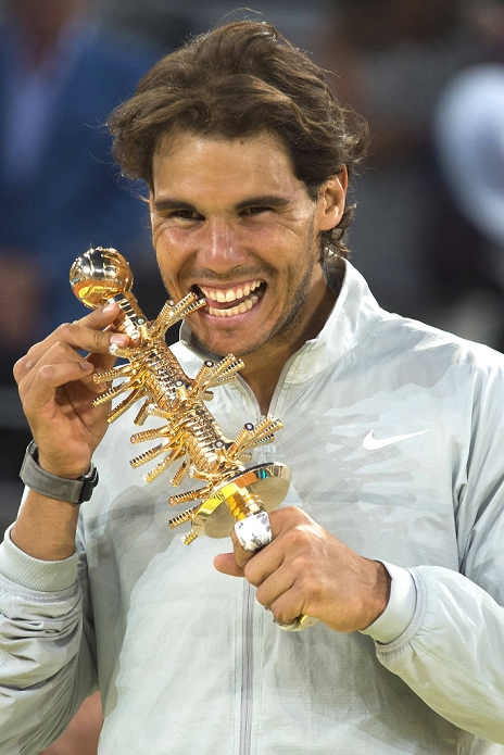 Madrid Open Men s Final Nadal wins Rafael Nadal  ESP , MAY 11, 2014   Tennis : Rafael Nadal of Spain celebrates with the trophy after winning the men s singles final match of the ATP Tennis World Tour Mutua Madrid Open at Manzanares Park Tennis Center  Caja Magica  in Madrid, Spain.  Photo by AFLO 