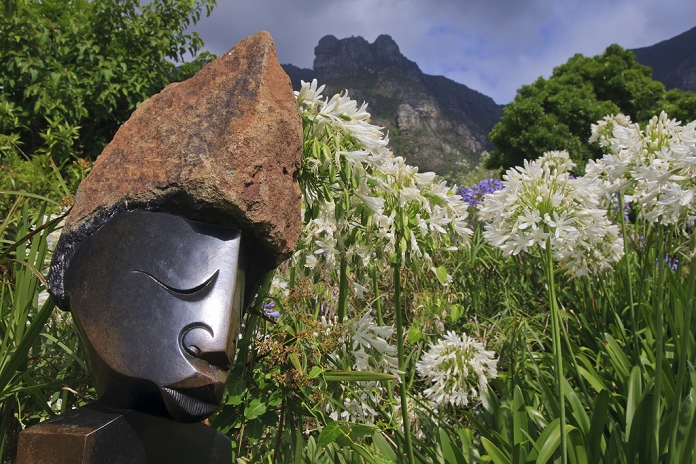 South Africa Statue with agapanthus and Table Mountain behind, Kirstenbosch National Botanical Garden, Cape Town, South Africa, Africa by Eleanor Scriven