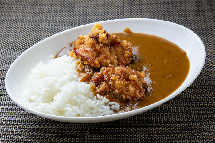 Curry rice topped with fried bean curd.