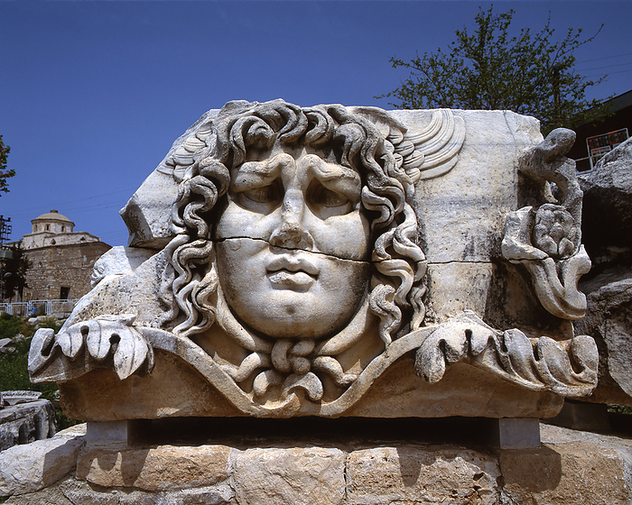 Didyma, Turkey, 2019. Creator: Ethel Davies. A stone carved face at the ruins of Didyma, or Didymaion, a sanctuary from ancient Greek Times whose main god was Apollo, although other deities were also worshipped here, Turkey, 2019. Creator: Ethel Davies.