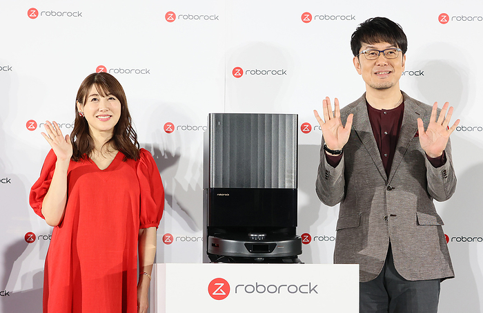 Japanese comedian Teruyuki Tsuchida and actress Megumi Yasu attend a prmotional event of a robot cleaner November 28, 2023, Tokyo, Japan   Japanese comedian Teruyuki Tsuchida  R  who is familiar with house electric appliances and actress Megumi Yasu  L  attend a promotional event of a compact robot cleaner  Roborock Q Revo  in Tokyo on Tuesday, November 28, 2023. Roborock Q Revo, manufactured by Beijing Roborock Technology, features automatically vacum cleaning and mop washing on the floor. Yasu is now plegnant and due in January.    photo by Yoshio Tsunoda AFLO 