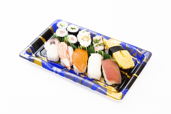 Packed sushi placed on white background