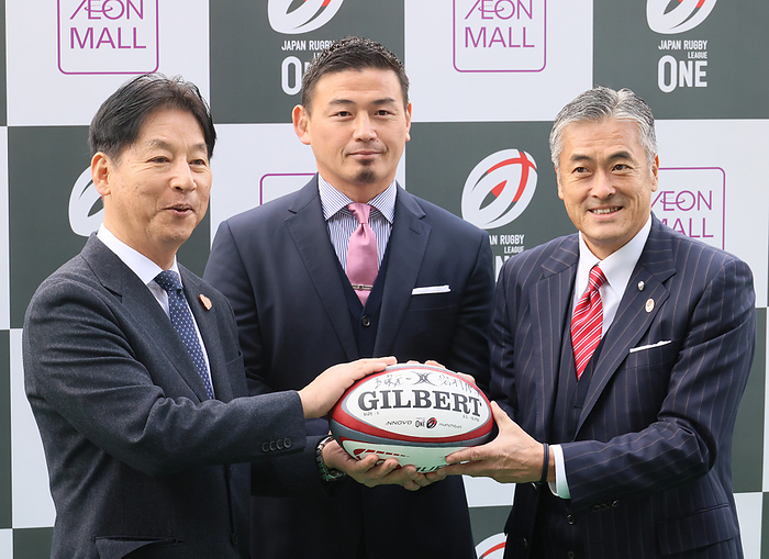 Japan s rugby league League One and largest shopping mall Aeon Mall agree a partnership December 1, 2023, Tokyo, Japan   Japan s largest shopping mall chain Aeon Mall president Koji Iwamura  L  and Japan s rugby league League One chairman Genichi Tamatsuka  R  with League One s team Shizuoka BlueRevs officer Ayumu Goromaru  C  hold a rugby ball as they agreed a partnership at the Prince Chichibu rugby stadium in Tokyo on Friday, December 1, 2023.    photo by Yoshio Tsunoda AFLO 