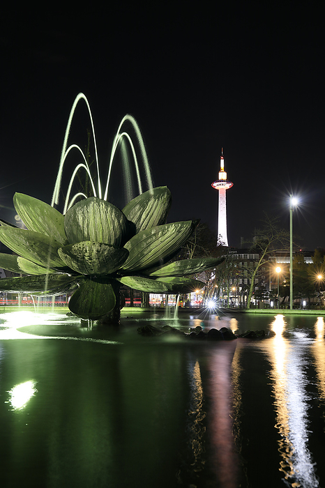 Illuminated fountain in front of Higashi Honganji Temple and Kyoto Tower Kyoto Prefecture