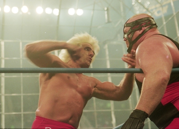 1994 WCW Flair vs. Bader 19940220, WCW, Ric Flair  left  punches Big Bang Vader, Thunder Cage Match, Albany Civic Center, Albany, GA, USA