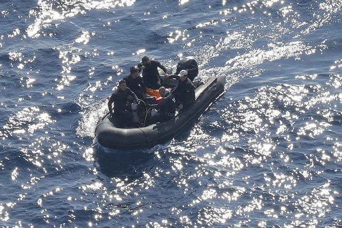Maritime Self Defense Force searching the area where the U.S. Air Force CV22 Osprey crashed with a rubber boat. The Maritime Self Defense Force searches the sea area where a U.S. Air Force CV 22 Osprey crashed with a rubber boat off Yakushima Island, Kagoshima Prefecture, Japan, at 0:02 p.m. on December 6, 2023, from a helicopter of the headquarters.