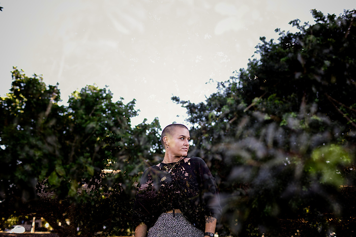Portrait of Non Binary Person with Shaved Head in San Diego, by Cavan Images / Jill Denny Soto